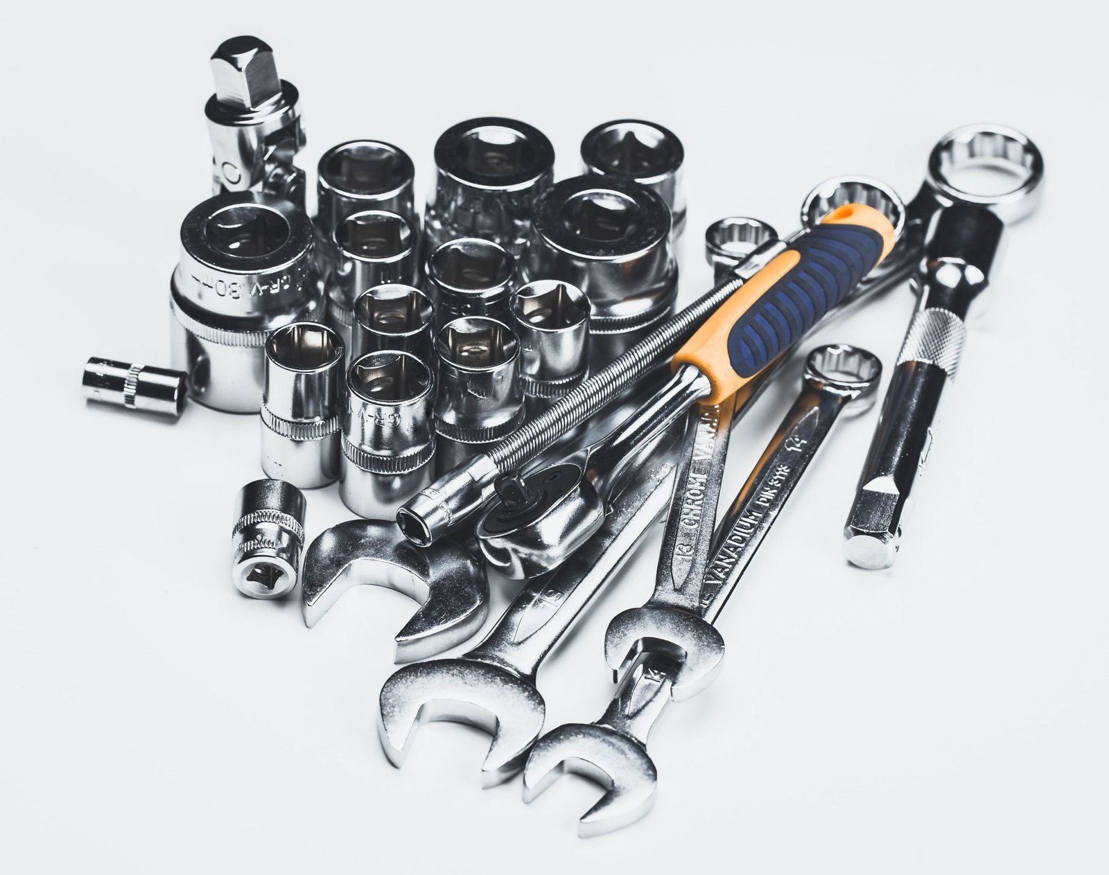 vecteezy-assorted-hand-tools-and-sockets-arranged-on-a-flat-surface-56578678